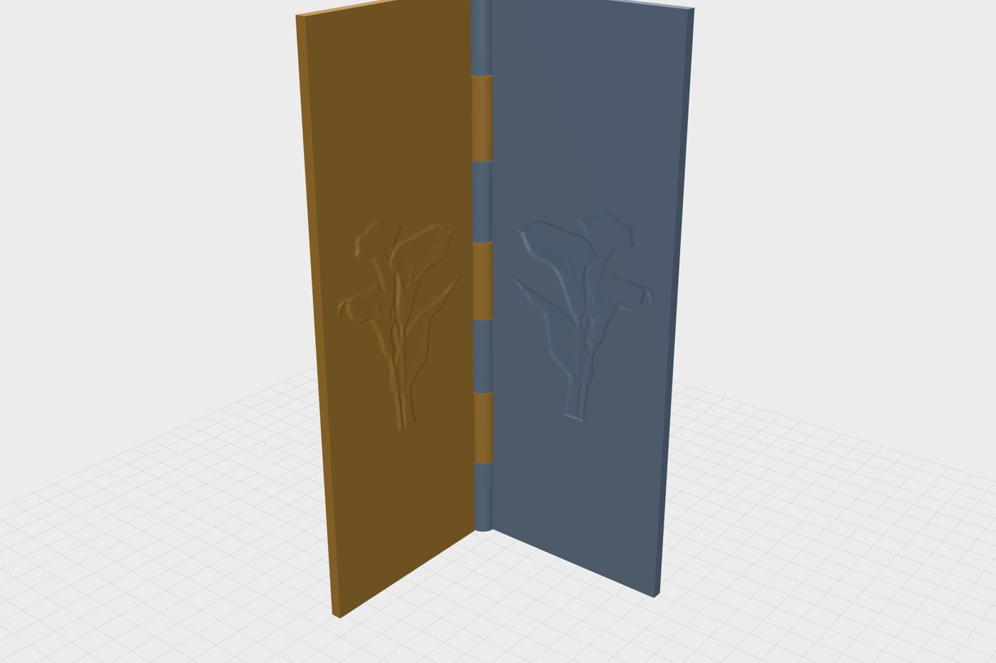 A 3D-printed hinged stamp standing open at ninety degrees: a calla lily raised on the positive and sunk into the negative